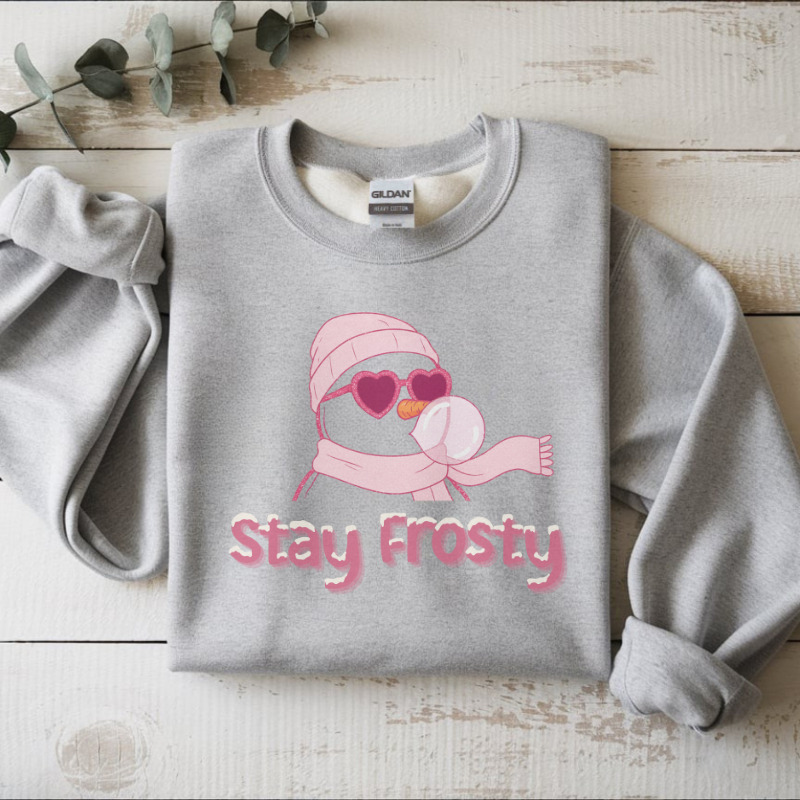 Stay Frosty Snowman Crewneck Sweatshirt | Trendy Christmas Bubblegum Snowman with Sunglasses | Cozy Unisex Holiday Sweater for Winter Fun