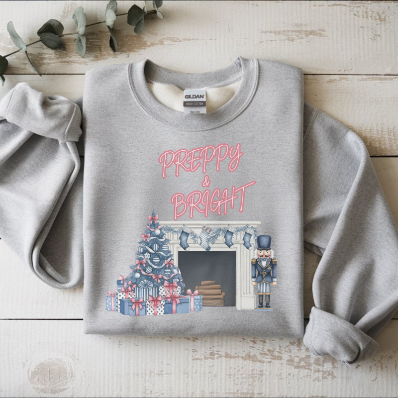 Preppy & Bright Christmas Sweatshirt | Blue Pink Holiday Crewneck with Nutcracker, Tree & Fireplace | Cozy Unisex Festive Winter Sweater