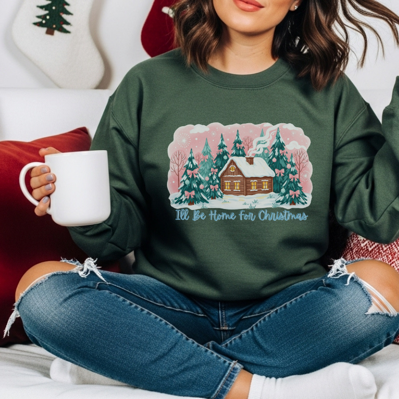 I’ll Be Home for Christmas Sweatshirt | Cozy Green Holiday Crewneck with Winter Cabin & Trees | Festive Christmas Sweater Gift