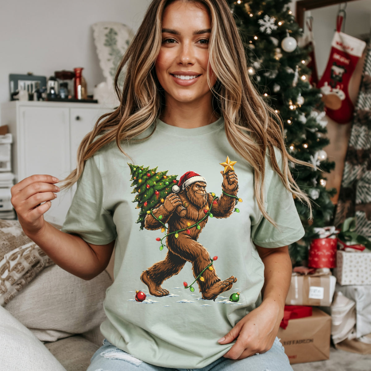 Sasquatch Carrying Christmas Tree T-Shirt — Holiday Bigfoot Santa Tee